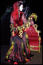 &copy; Kambriel - All Rights Reserved. width=166 height=250><br><font size=-1>Monica in Volcanic Gown worn for the 